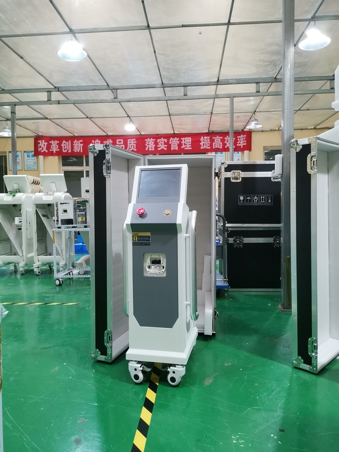Vertical three wavelength 808 755 1064nm diode laser for hair removal. Buy a cosmetic laser for hair removal. Chinese factory.