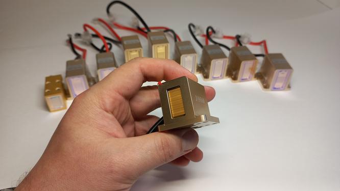 Checking the operability of the diode laser handle for hair removal. Checking the operability of the diode laser handle for hair removal.