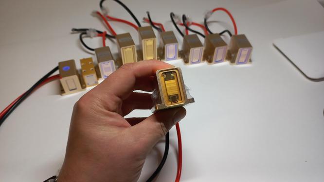 Checking the contacts and connectors of the laser handle for reliability. Checking the contacts and connectors of the laser handle for reliability.